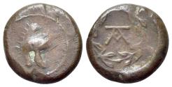 Ancient Coins - Sicily, Tauromenion, Campanian mercenaries, c. 392-358 BC. Æ 12mm. Campanian helmet. R/ Monogram within laurel wreath.