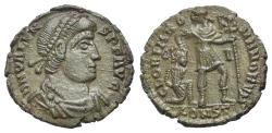 Ancient Coins - Valens (AD 364-378). Æ 18mm. Arelate, 364-7. R/ Emperor holding labarum dragging kneeling captive
