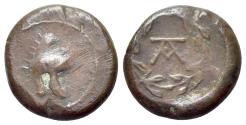 Ancient Coins - Sicily, Tauromenion, Campanian mercenaries, c. 392-358 BC. Æ 12mm. Campanian helmet. R/ Monogram within laurel wreath.