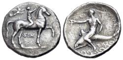 Ancient Coins - ITALY. Southern Apulia, Tarentum. Circa 330-325 BC. AR Nomos R/ Phalanthos riding dolphin