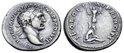Ancient Coins - Trajan (AD 98-117). AR Denarius. "Dacia Capta" commemorative. Rome mint. Struck circa AD 103-107. R/ Dacian captive seated at foot of trophy.