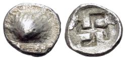 Ancient Coins - Epirus, Corcyra (circa 450-400 BC) AR Obol. Scallop shell / Incuse swastika.  Of the highest rarity.