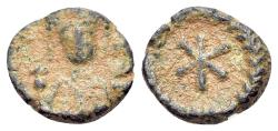 Ancient Coins - Justinian I (527-565) Æ Nummus. Carthage, AD 565-578. R/ STAR Extremely Rare.