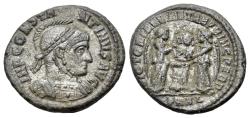 Ancient Coins - Constantine I (307/310-337). Æ Follis. Arelate, AD 319. Laureate, helmeted and cuirassed bust r. R/ Two Victories facing