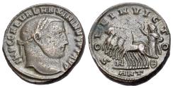 Ancient Coins - Maximinus II (AD 310-313). Æ Nummus - Follis. Bust to r. R/Sol in quadriga