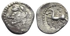 Ancient Coins - Central Gaul, Bituriges Cubi, c. 1st century BC. AR Quinarius R/ Horse prancing; sword above; pentagram below