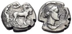 Ancient Coins - Sicily, Syracuse, 466-405 BC. AR Tetradrachm, c. 450-440 BC. Charioteer driving quadriga R/ Head of Arethousa