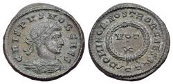 Ancient Coins - Crispus (Caesar, 316-326). Æ Follis. Ticinum. R/ DOMINOR NOSTROR CAESS / TT. VOT X within wreath.