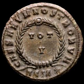Ancient Coins - Constantine II (Caesar, 316-337). Bronze follis, Siscia. - CAESARVM NOSTRORVM / ASIS star. VOT / V in two lines within wreath.