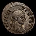 Ancient Coins - Crispus (Caesar, 316-326). Follis. Arelate. - CAESARVM NOSTRORVM VO / TIS / V in three lines; TA.
