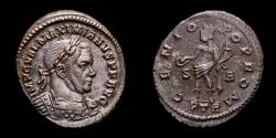 Ancient Coins - Maximian Herculeus - Æ large follis. Trier, AD 307. - GENIO POP ROM, Genius.