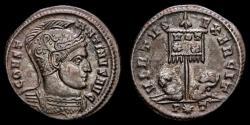 Ancient Coins - Constantine I (307-337 A.D.) Æ Follis. Ticinum, AD 319-320. - VIRTVS EXERCIT / P✩T two captives at foot of standard.