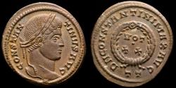 Ancient Coins - Constantine I (307-337 A.D.) - Æ Bronze Follis. Ticinum AD 321. D N CONSTANTINI MAX AVG, VOT • XX in wreath. TT in exergue.