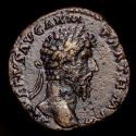 Ancient Coins - Lucius Verus (161-169 A.D.) Æ Sestertius. Rome, AD 165-166. - TR POT VI IMP III COS II, Victory, erecting trophy and holding palm.