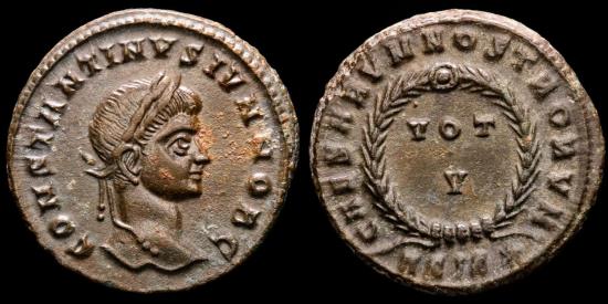 Ancient Coins - Constantine II (Caesar, 316-337). Bronze follis, Siscia. - CAESARVM NOSTRORVM / ASIS star. VOT / V in two lines within wreath.