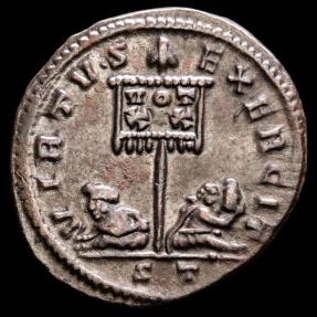 Ancient Coins - Constantine I (307-337 A.D.). Æ Follis. Ticinum. - VIRTVS EXERCIT, two captives at foot of standard inscribed VOT XX.