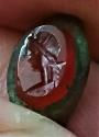Ancient Coins - Small Roman carnelian intaglio with an image of a woman's head.